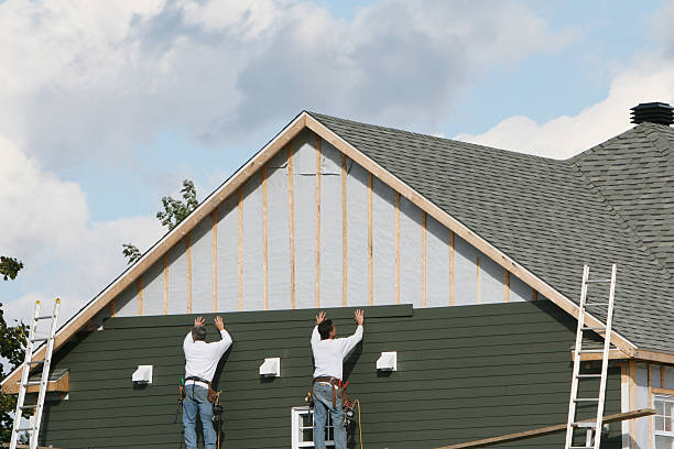 Professional Emergency Siding Repair technician working in Julian, PA